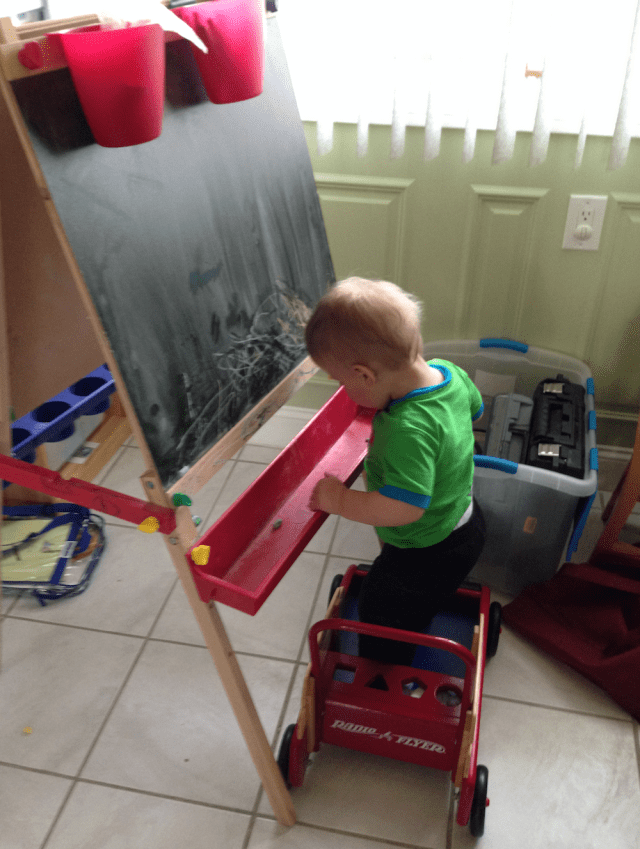 Standing in the wagon. Not really safe at all. Kind of therapeutic though! Good balancing Colten!