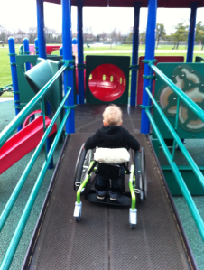 Boulan Park in Troy had two big structures with ramps. The entire play area had rubber flooring, too. However, there wasn't much for Colten to do once he got UP the ramp, so we took him out and let him crawl around instead.