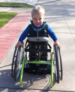 First mobile stander - hates getting into it and then hates getting out of it! Which means he LOVES being in it :-)